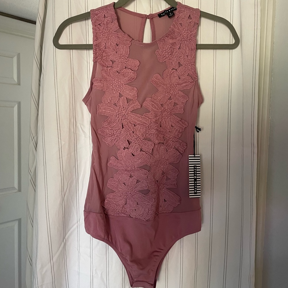 Rose color bodysuit. Never worn. Size small.
